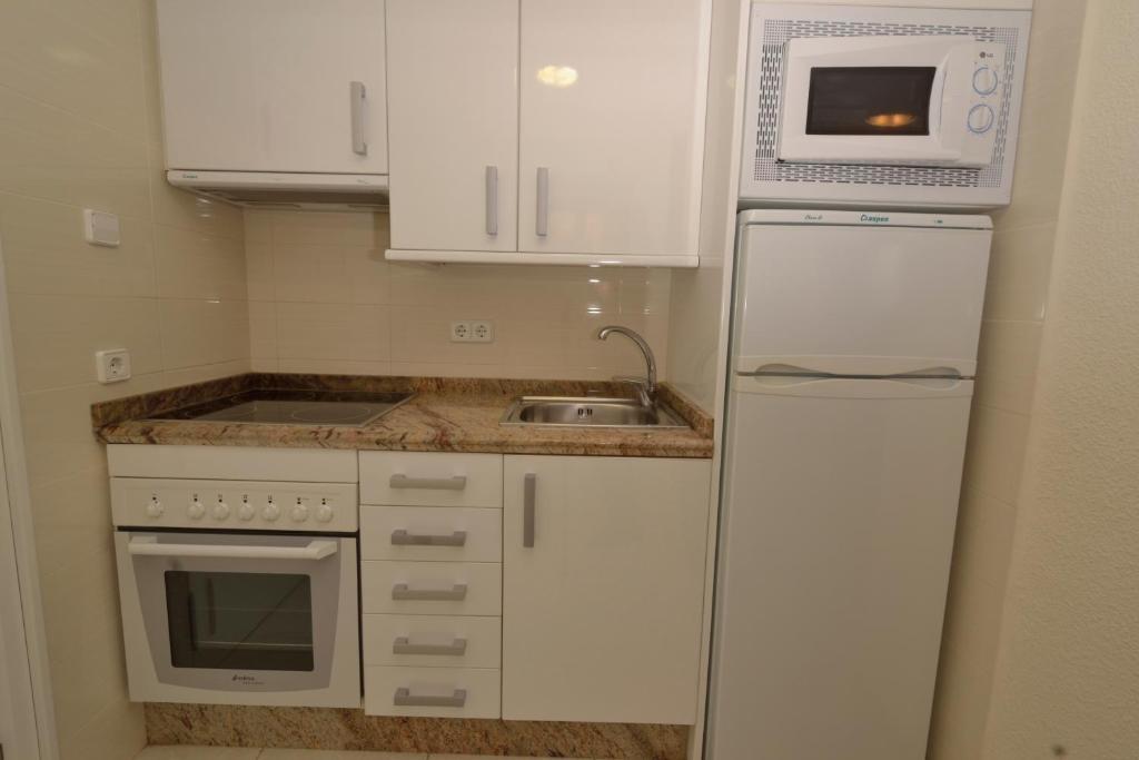 Apartamentos Turmalina Unitursa كاليبي الغرفة الصورة